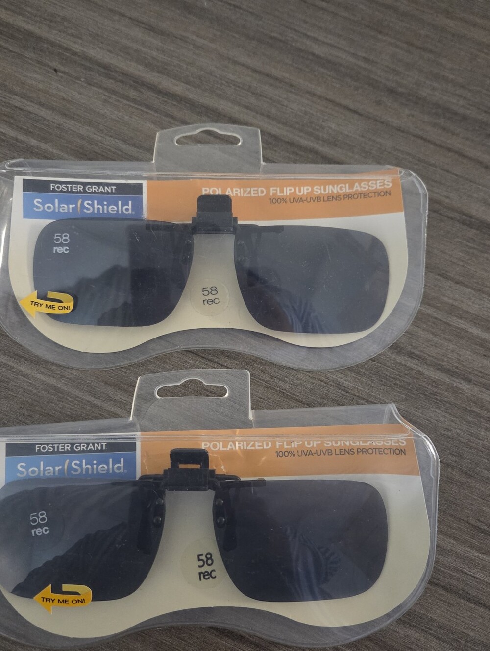 Foster Grant Solar Shield polarized flip sunglasses - new - 2 pairs